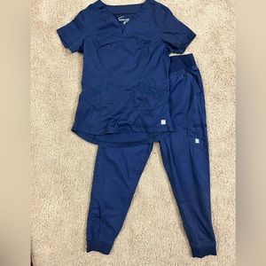 Navy blue XSP scrubs by Uniform Advantage